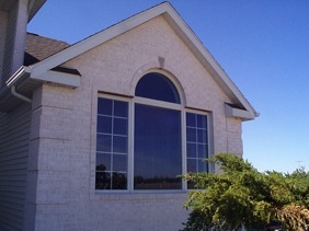 Brick arch window showing masonry construction defect